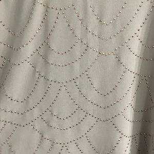 Blousy, gold/greenish brown top with gold accents.